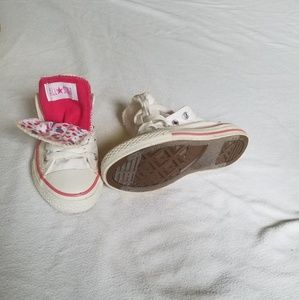 Girls converse "All Star" sneakers.